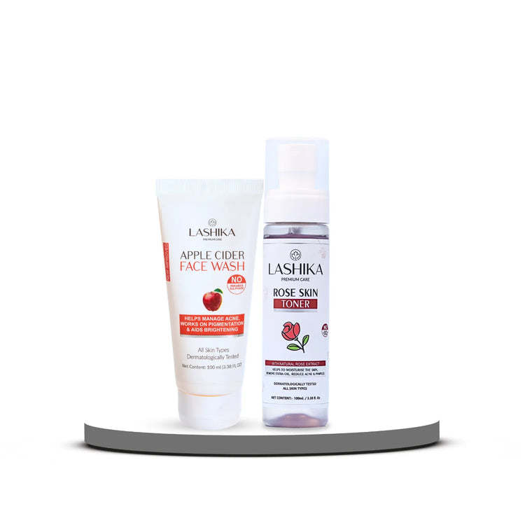 A set of two Lashika skincare products displayed on a white surface. From left to right, the products are:
Lashika Apple Cider Face Wash: A white tube with a red cap. It helps to reduce acne, works on pigmentation, and aids in brightening. It is suitable for all skin types and is dermatologically tested.
Lashika Rose Skin Toner: A transparent bottle with a pink pump. It helps to moisturize the skin, reduce acne and pimples, and is suitable for all skin types. It is dermatologically tested.
