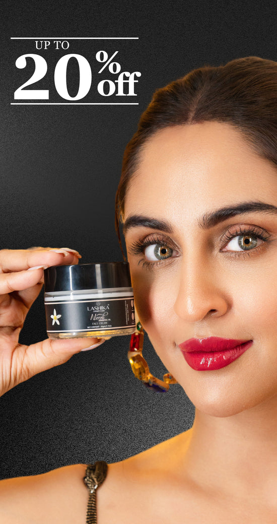 Krystle D'Souza holding Lashika Neroli Essential Oil Face Cream with a radiant smile.