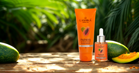 Lashika Papaya Anti Blemish Facewash and Papaya Face Serum placed on a wooden surface with fresh papayas and tropical greenery in the background.