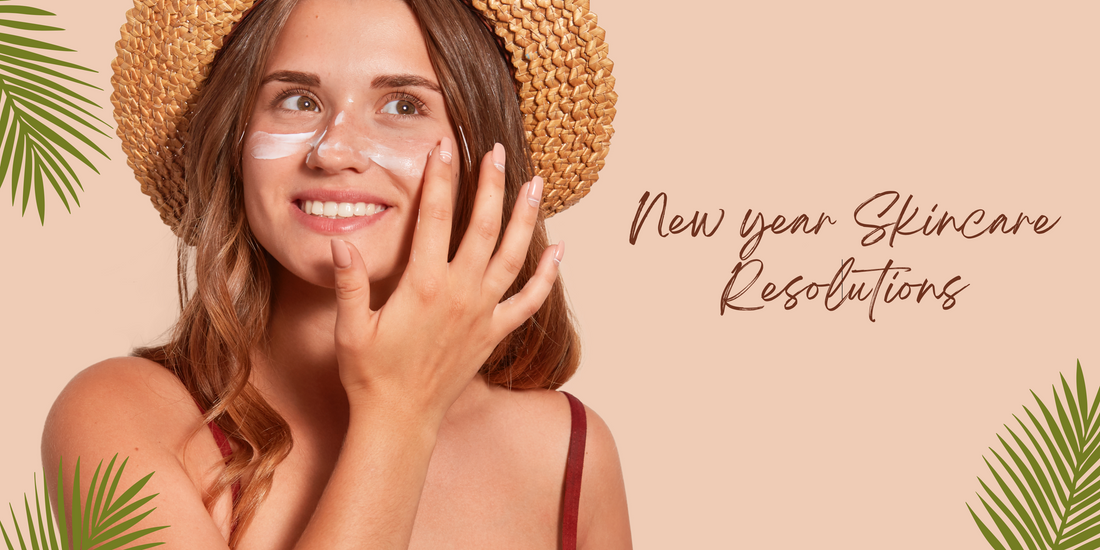 Smiling woman wearing a straw hat, applying skincare cream under her eyes, with the text 'New Year Skincare Resolutions' and tropical leaf accents