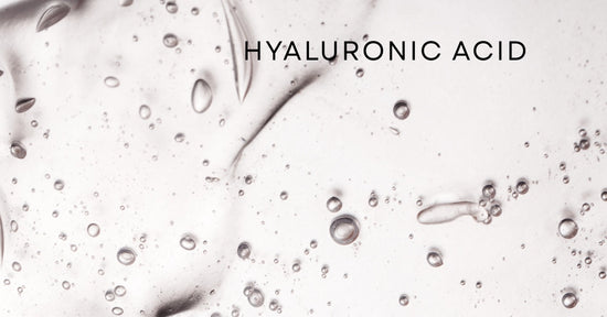 A close-up image of clear hyaluronic acid gel with visible air bubbles, showcasing its smooth and hydrating texture. The word "HYALURONIC ACID" is written in black uppercase font on a light background.