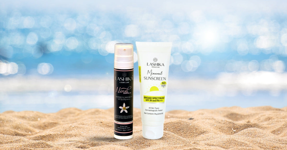 Two Lashika sunscreens placed on beach sand with a blurred ocean background. One is the Lashika Neroli Hybrid Sunscreen SPF 50 PA++++ in a black bottle, and the other is Lashika Mineral Sunscreen SPF 30 PA+++