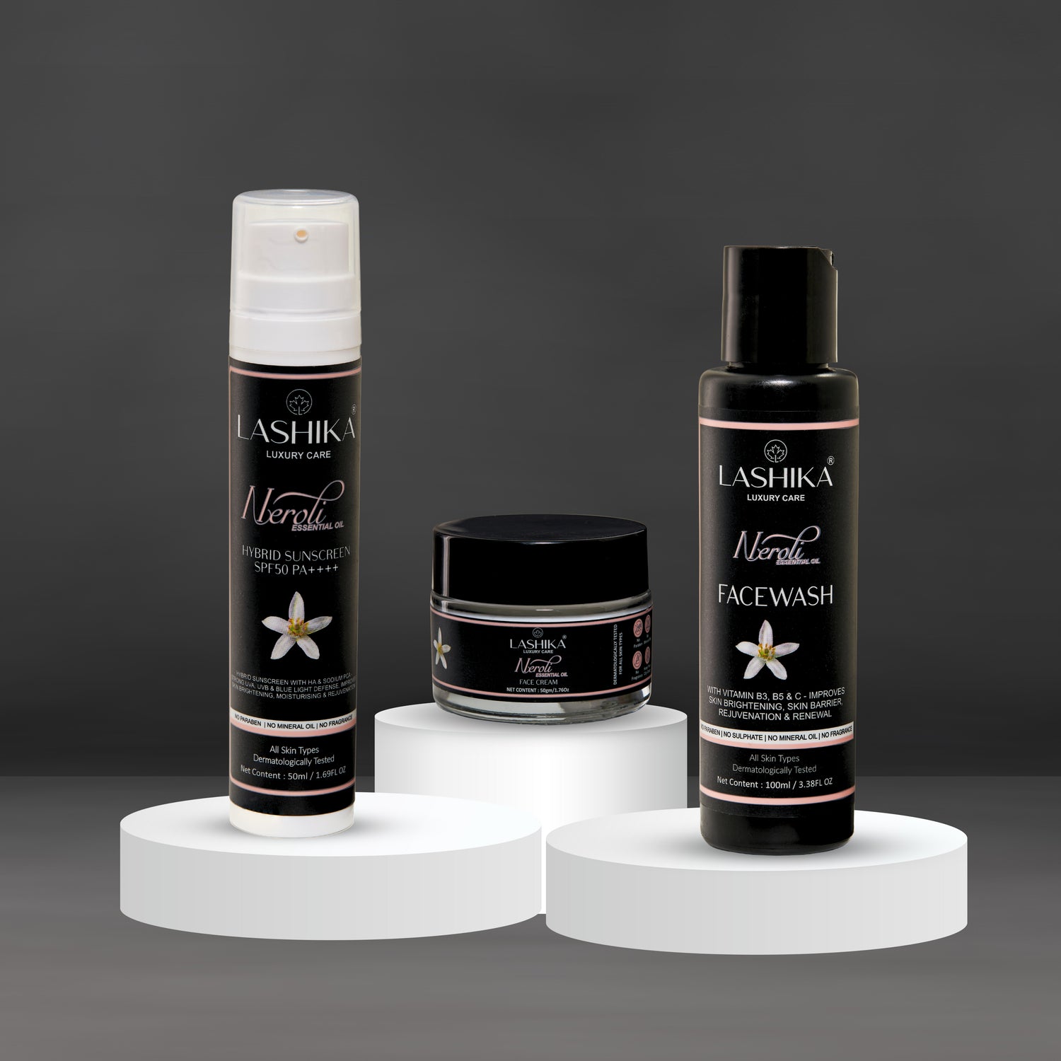 A trio of Lashika Neroli skincare products, including a Hybrid Sunscreen with SPF 50 PA++++, a gentle Face Wash, and a nourishing Face Cream, all designed to protect and enhance the skin&